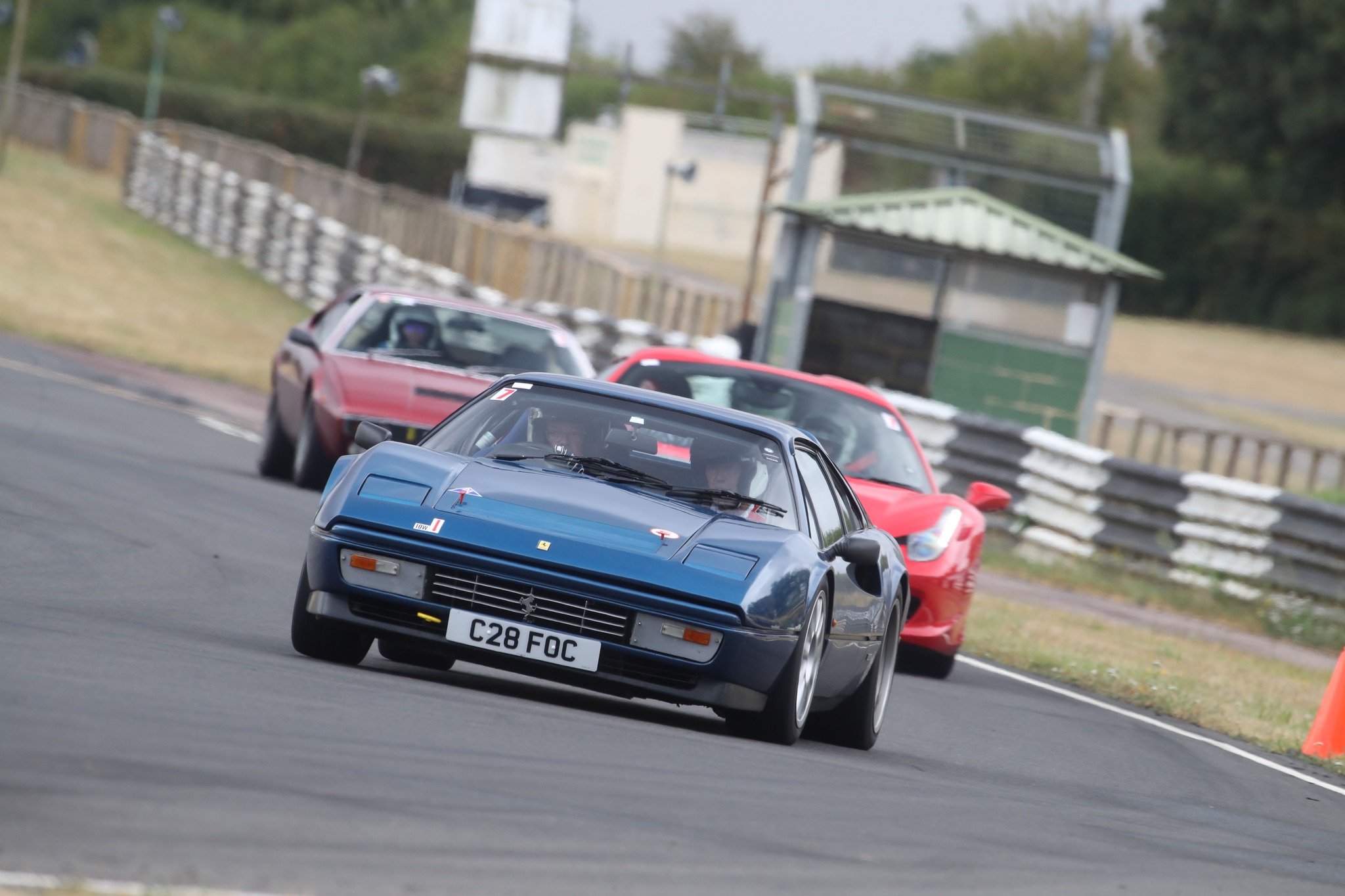 The Club returned to Castle Combe for it's final track day of 2026. The weather was mostly dry with a couple of very wet spells, which gave drivers the opportunity to experience the performance of their Ferraris in different conditions, with the majority opting to include an optional driver coaching session (or more) across the day. A selection of photos are available
A selection of photos are available to enjoy on Flickr. Members wishing to see further photos or purchase high res photos can do so by contacting the photographer from the day, Jim Gaisford, on jimgaisford@gmail.com.