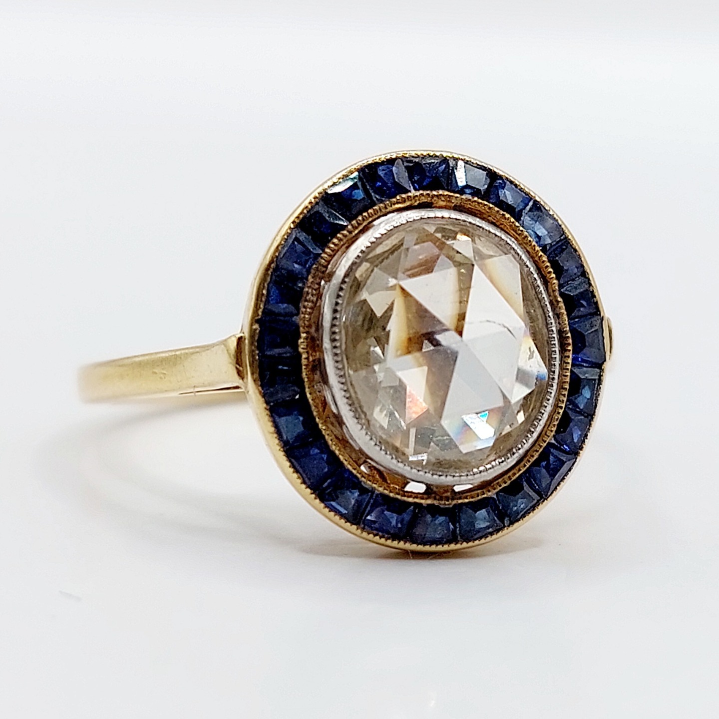 /// SOLD \\\ French antique target ring 18k gold and platinum set with a 1.60 carat rose cut diamond surrounded by calibrated sapphires (circa 1920)
PRICE : 3900€
Magnificent and rare antique French goldsmith work
Size: 55 FR / 7 US
Weight: 3.23 g
Diamond size: approximately 8.5 x 7.0 x 3.0 mm (estimated at 1.60 carats)
Diamond in perfect condition, slightly yellow in color, with small inclusions visible under magnification
Ring head size: 13.5 mm
Slight wear to the sapphires visible only under magnification
Micro scratches from use and traces of previous resizing
Eagle head and dog head hallmarks (French hallmarks)
#frenchjewelry #diamond #diamondring #antiquering #victorian #victorianring #marquisering #augustusjewels #vintagering #daisyring #daimondhaloring #tragetring #oldminecut #oldminecutdiamond #oldeuropeancutdiamond